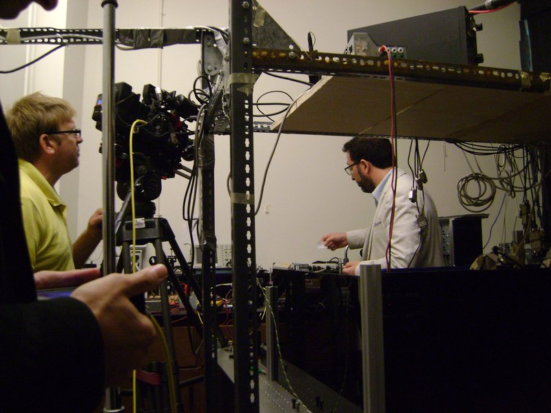 Professor Aephraim Steinberg being filmed in his lab.
