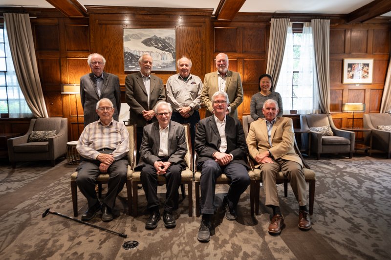 Faculty sitting in a group.