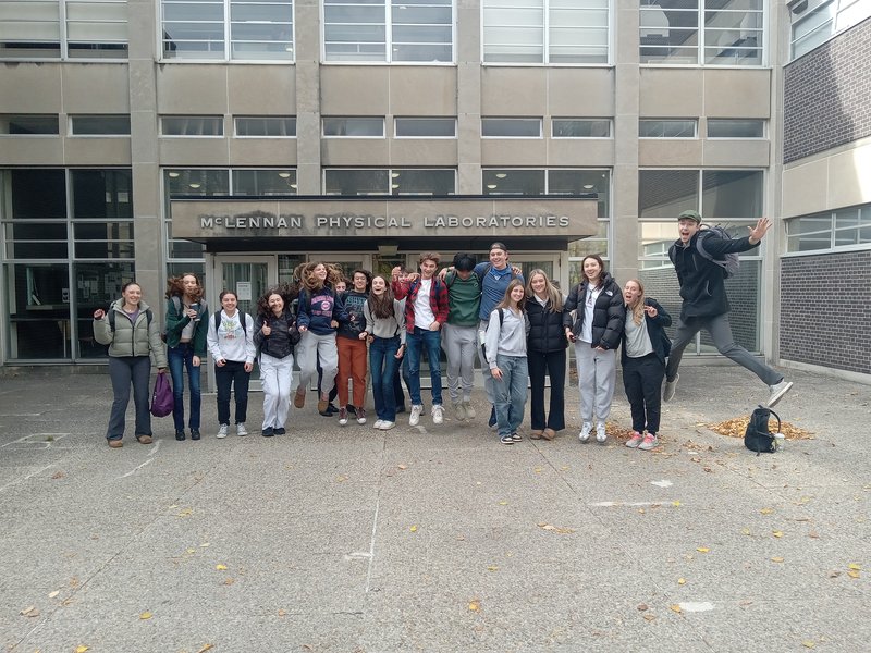 group of students in front of the Physics building