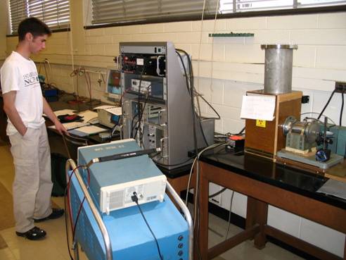 Photo of student working on the experiment.